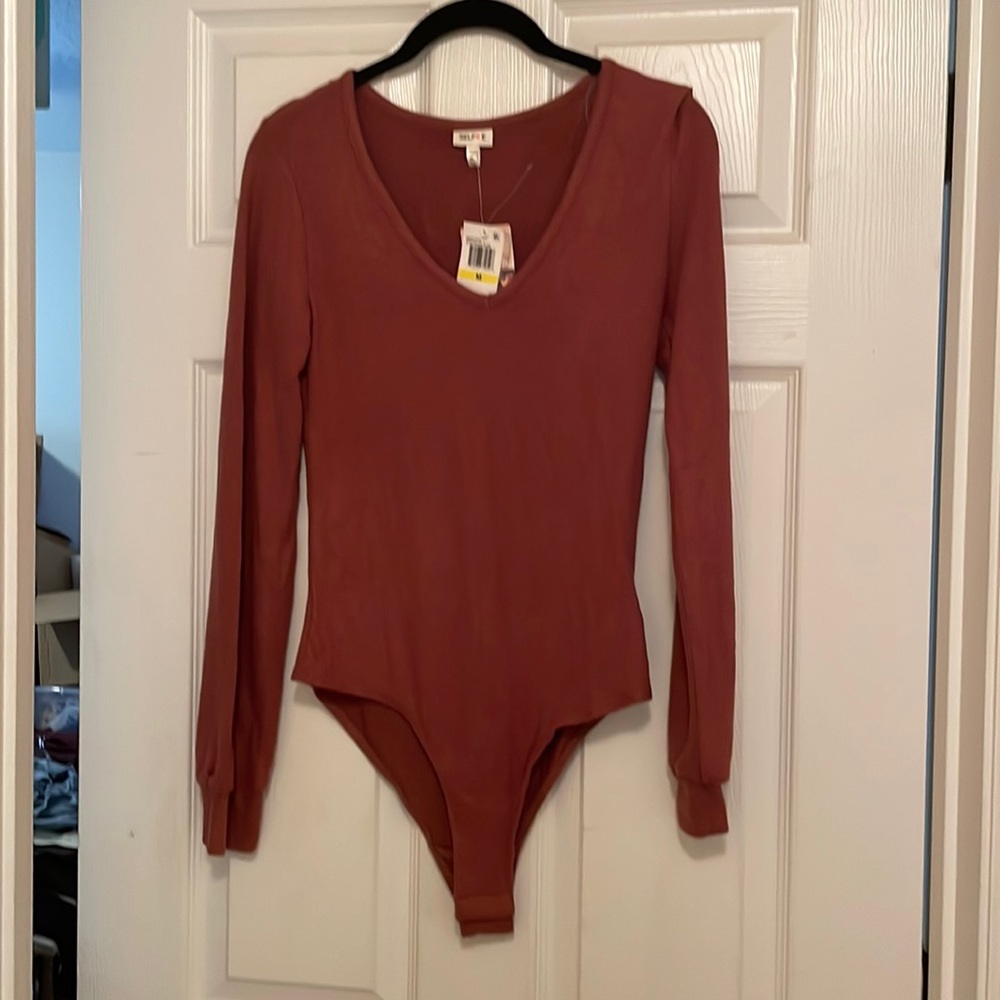 2 “Selfie” bodysuits in medium - one in cocoa rose & the other in wineberry!